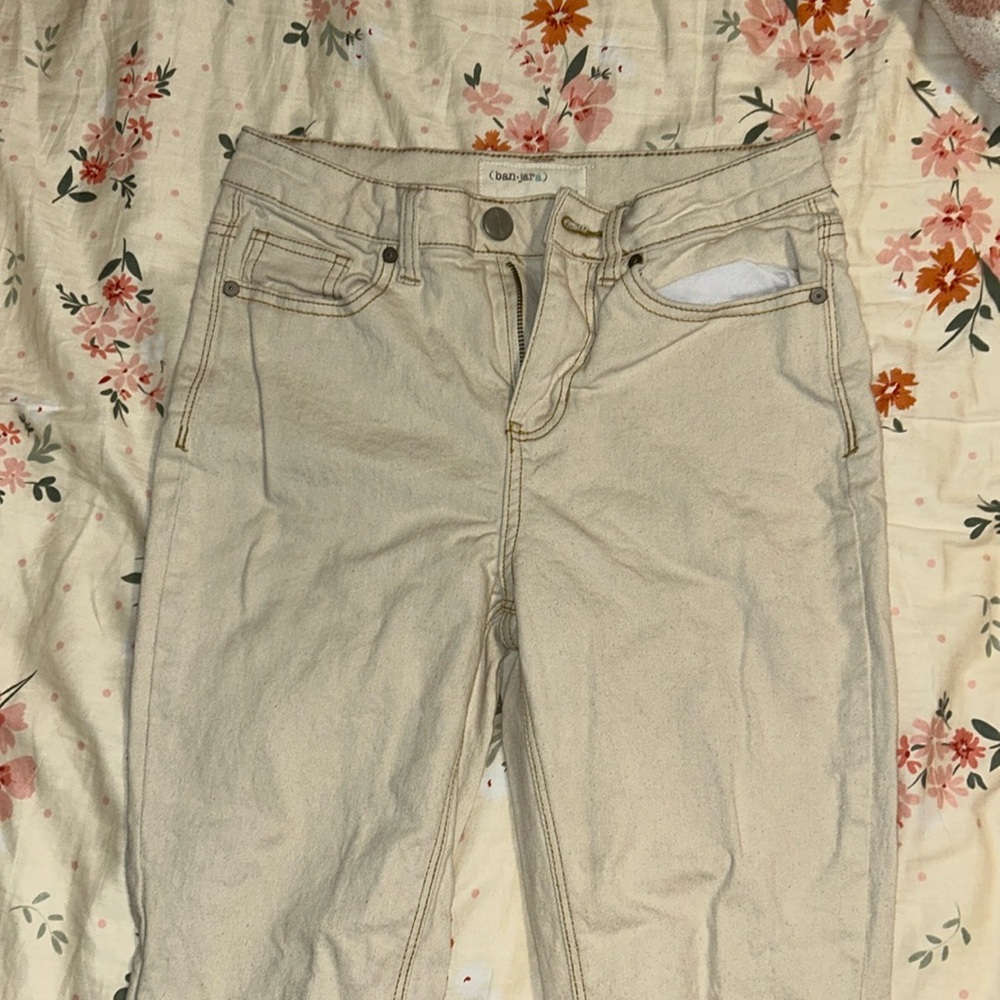 Selling flair cream jeans